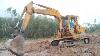Excavator Dig Tree Stumps Excavator Use Push Pull Boom To Lift Crawler To Clean Crawler Before Move