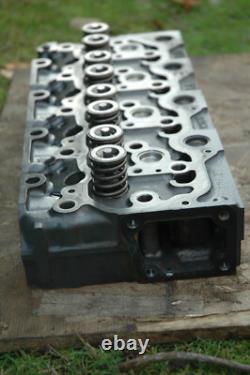 KUBOTA V2403 COMMON RAIL DIESEL ENGINE CYLINDER HEAD only 420 hours on it OEM