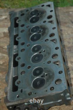 KUBOTA V2403 COMMON RAIL DIESEL ENGINE CYLINDER HEAD only 420 hours on it OEM